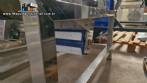 Alimentador posicionador abastecedor vibrat�rio em a�o inox de tampas TecnoEnvase TAG 5000